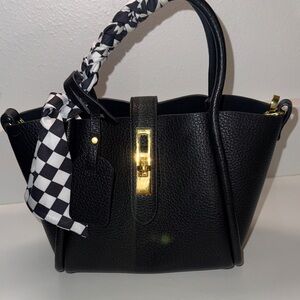 Elegant Black Fashion Handbag with Gold Accents